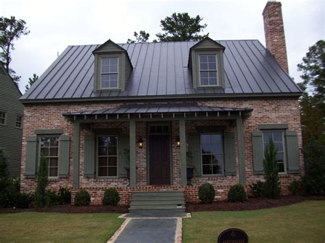 cocoa brown metal roof red brick house|brown houses with red roof.